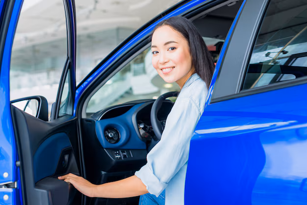 happy-woman-car-dealership_23-2148130185