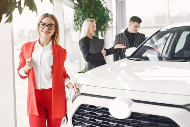 stylish-elegant-people-car-salon_1157-30114