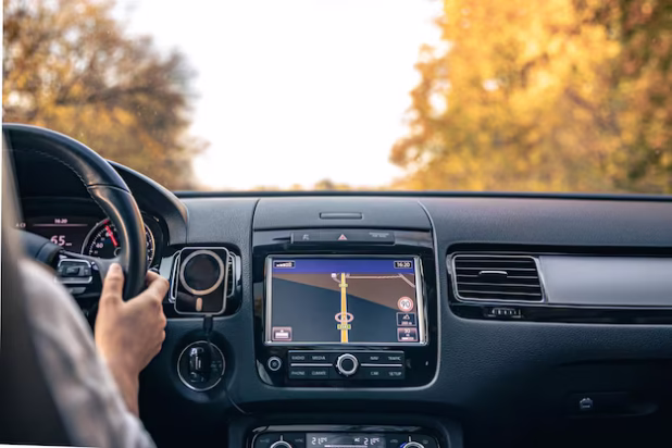woman-driver-hands-steering-wheel-inside-car_169016-46611