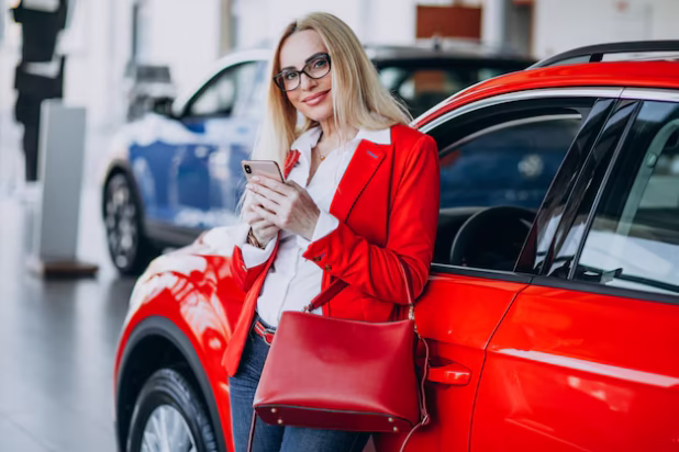 business-woman-looking-auto-mobile-car-showroom_1303-21315