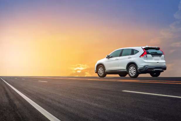car-road-against-sky-sunset_1048944-13167263
